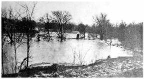 Old photo of flood at the Westport Covered Bridge